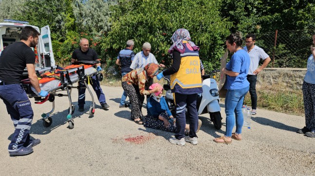 Elektrikli motosikletten düşüp yaralandı